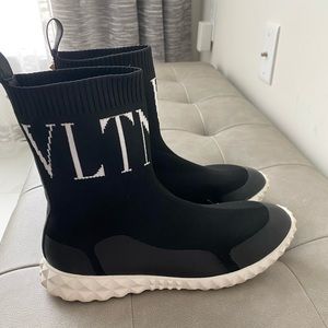 Copy- black Valentino sock sneakers. Warn 3 times. Runs smaller fits 7.5